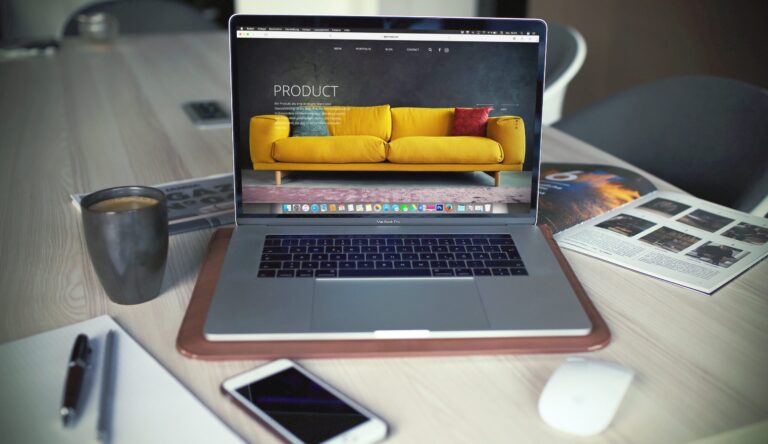 A laptop showing a yellow couch and the word product denoting product descriptions